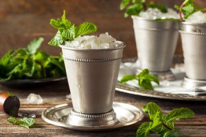 56016514 - cold refreshing classic mint julep with mint and bourbon
